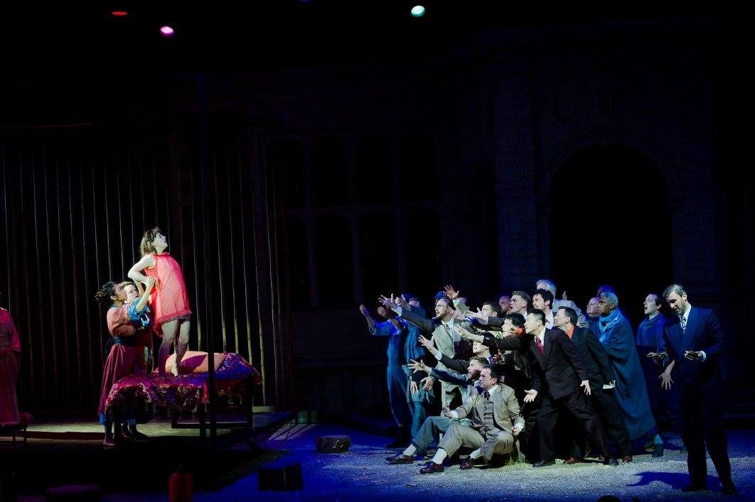 Act 2, the Yoshiwara: chorus in dark suits
