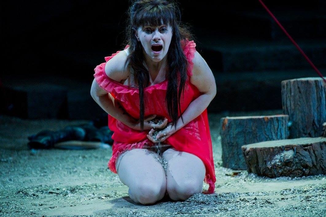 Iris kneeling, crying out