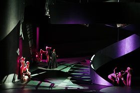 Dancers on a dark, angular set