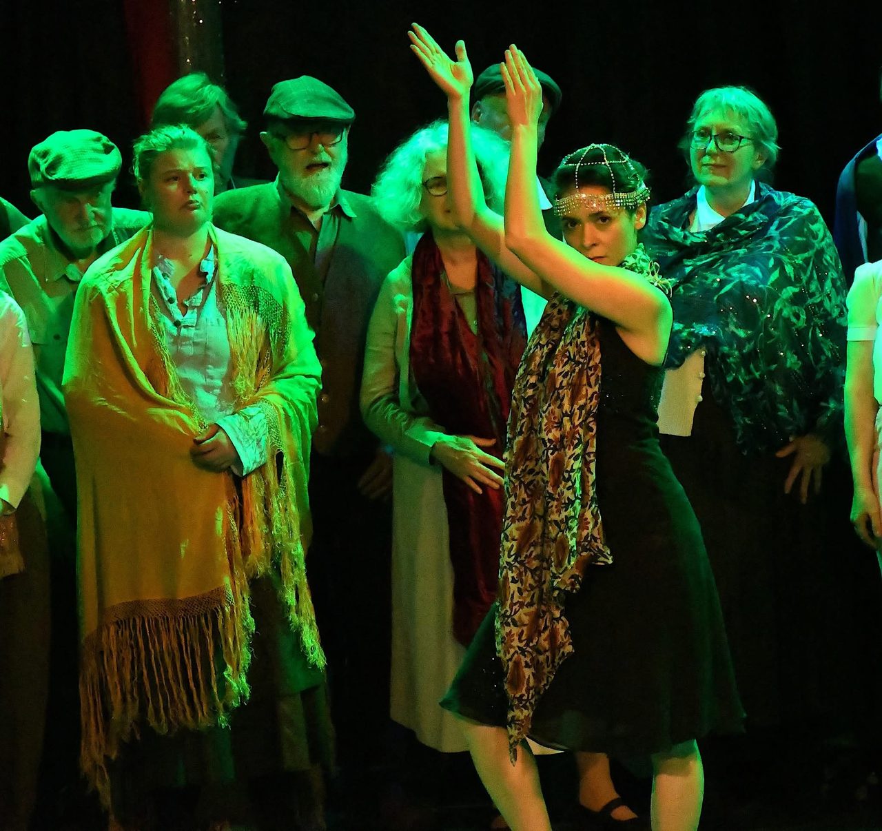 Fiametta dancing among the chorus, green light